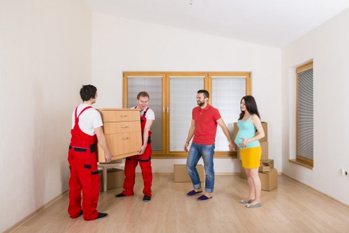 Office moving professionals handling equipment in Manandvan Earlscourt