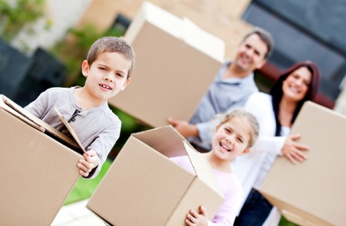 Professional movers assisting with packing