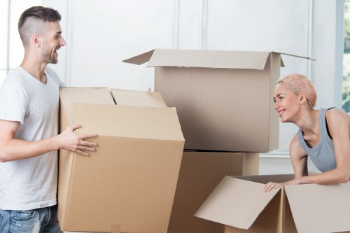 Experienced movers handling furniture with care